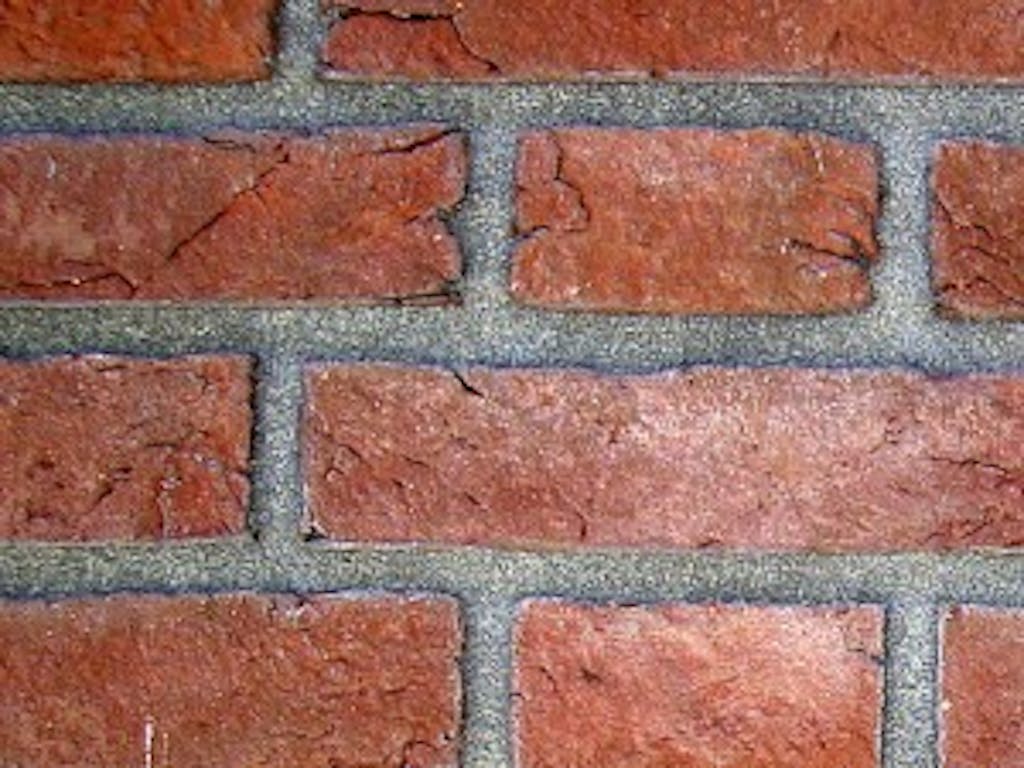 Chemisch reinigen gevel 1 holle voeg